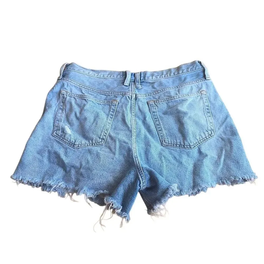 Free people we the free Sz 32 wash blue  distressed jean shorts